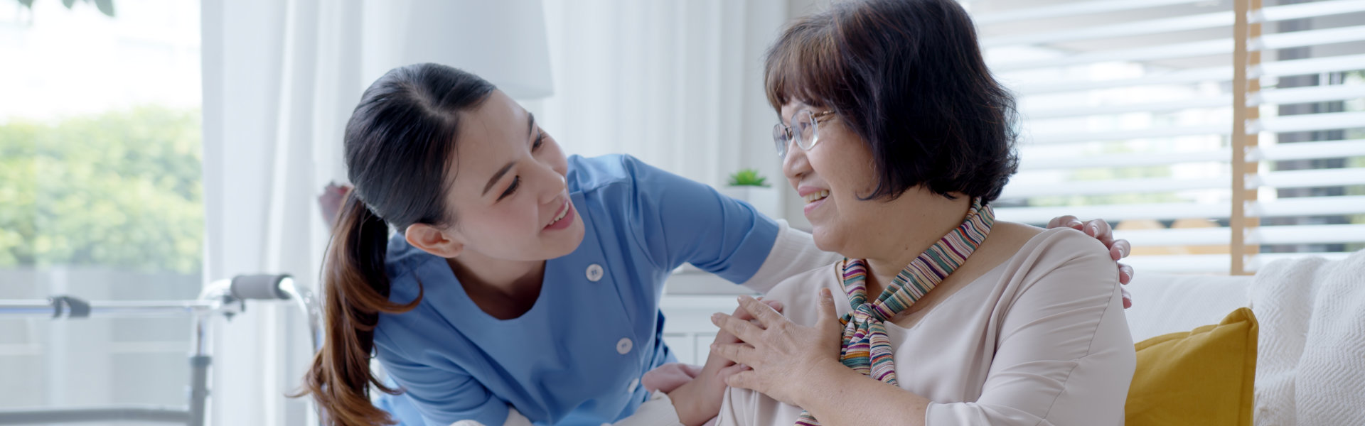 caregiver talking to elderly